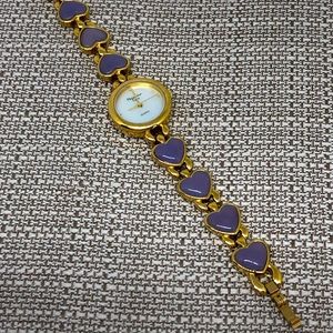 Vintage gold, pearl face and Purple Hearts watch
